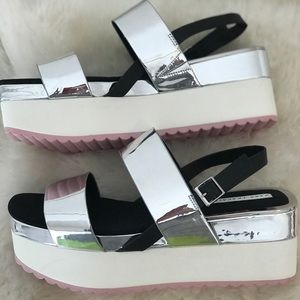 Metallic silver platform sandals never worn.